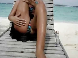 sexy wife masturbating at the beach